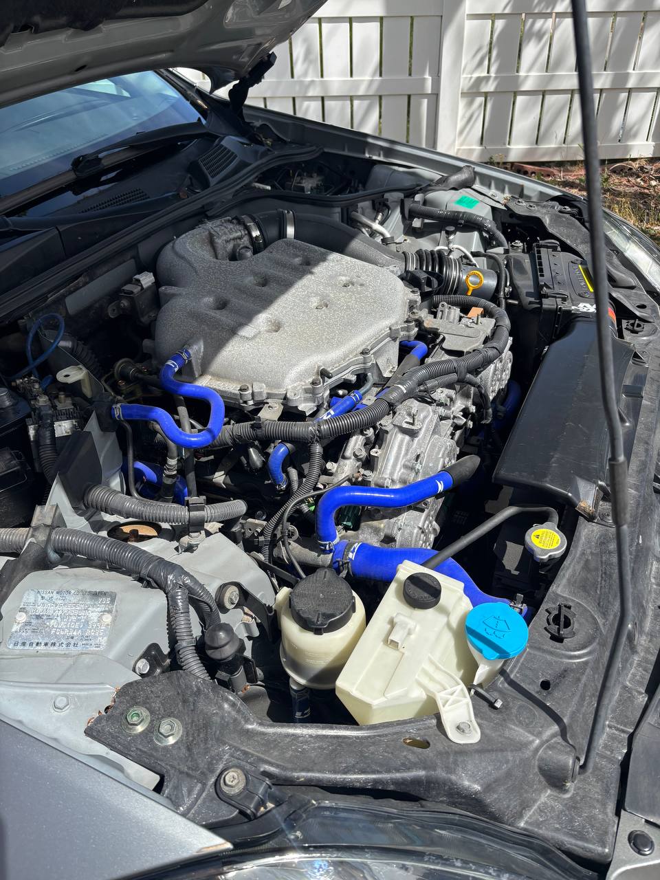 Before: dusty and grimy engine bay